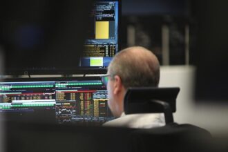 Dax startet freundlich – Merck-Aktien gefragt
