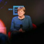 Linke: Merkel für EU-Verdienstorden geeigneter als Merz