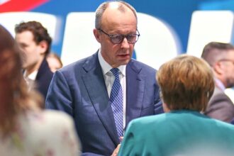 Merkel wirbt für Geduld mit Regierung Merz