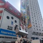 Rauchentwicklung im “Peacetower”:  Feuerwehr rückt zu Brand in Augsburger Hochhaus aus